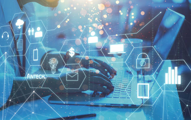 istock Businessman with fintech icon and internet of things with matrix code background, Investment and financial internet technology concept. 852000280