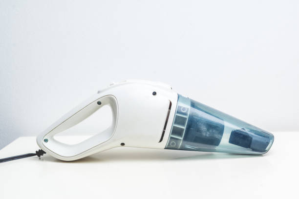 istock a hand-held vacuum cleaner on a white background 852000408