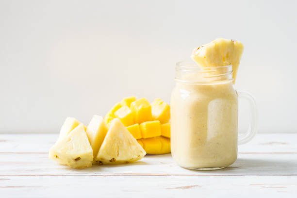 istock Mango, Banana, Pineapple and Oatmeal Smoothie in the Jar 852002218