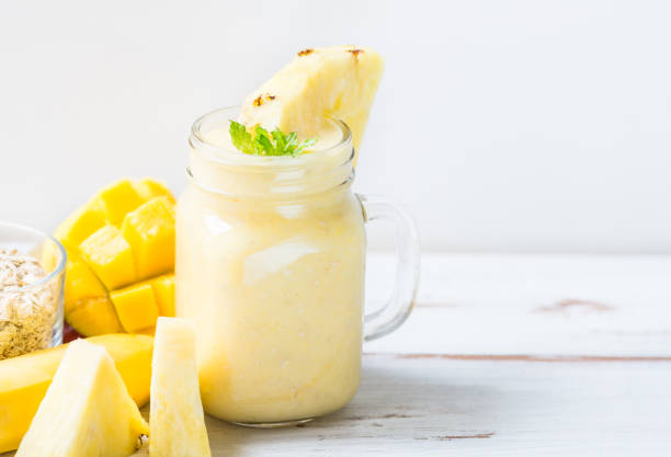istock Mango, Banana, Pineapple and Oatmeal Smoothie in the Jar 852002912