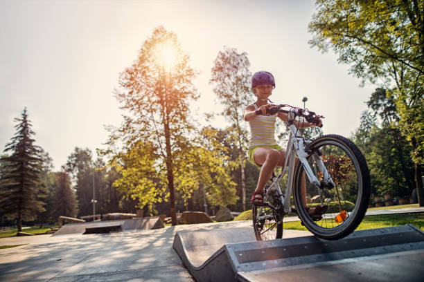 istock Little girl riding a bicycle on ramp 852004024