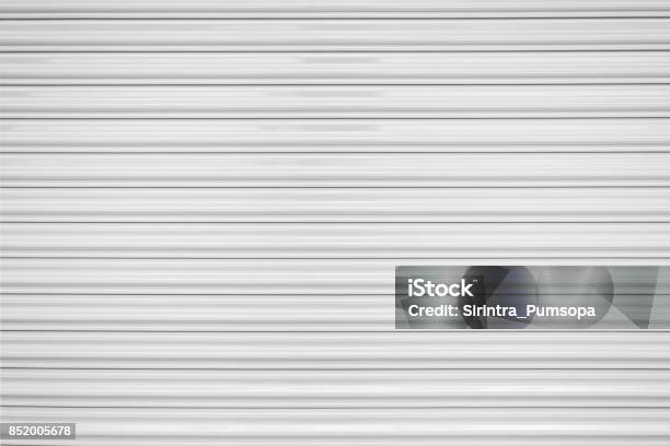 The Texture Of Corrugated Metal Sheet White Or Gray Galvanizes Steel Rolling Shutter Stock Photo - Download Image Now