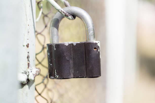 istock metal lock on the fence 852006648