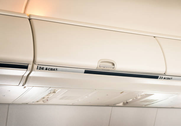 istock Cabin luggage locker on a commercial airliner 852007148