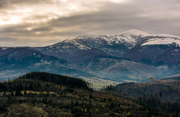 istock mountain ridge with snowy peak on gloomy day 852009210
