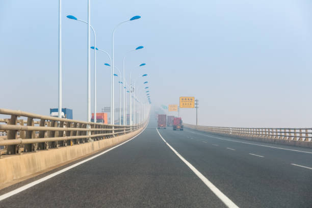 istock container trucks on the east china sea bridge 852010450