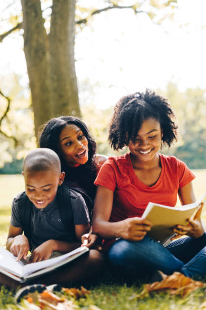istock mother helping the kids doing the homework 852013592