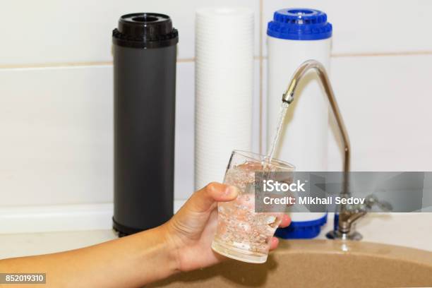 Great Filters To Purify Your Drinking Water An Image Isolated In The Kitchen Interior Stock Photo - Download Image Now