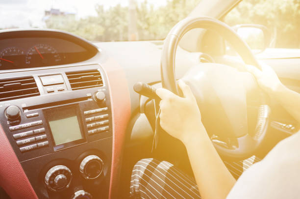 istock woman hand driving car 852019688