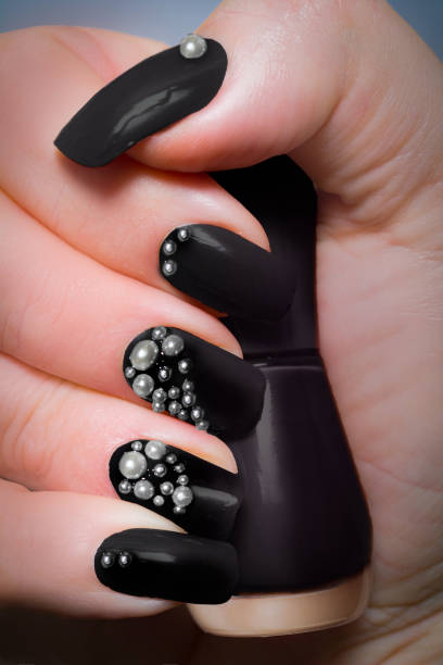 black pearl fashion nail tendenze inverno - perla nera foto e immagini stock