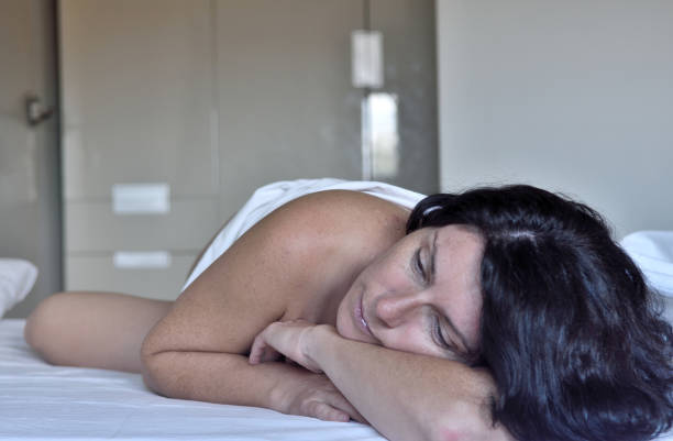 istock woman in a bedroom 852028684