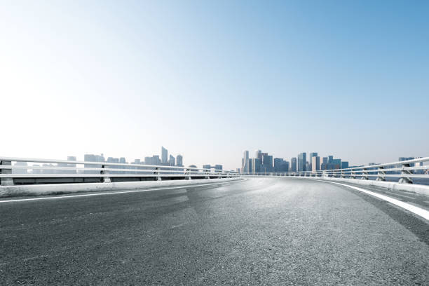 istock empty asphalt road with cityscape of modern city 852030096
