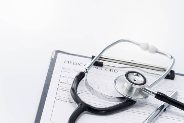 istock Stethoscope and medical record on white background. 852030496