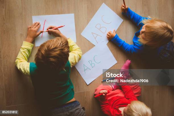 Kids Write Letters Do Homework Stock Photo - Download Image Now - Child Care, Writing - Activity, Toddler