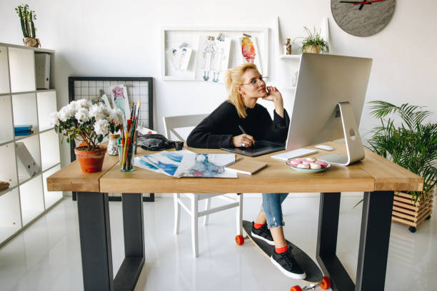 fashion designer working with devices