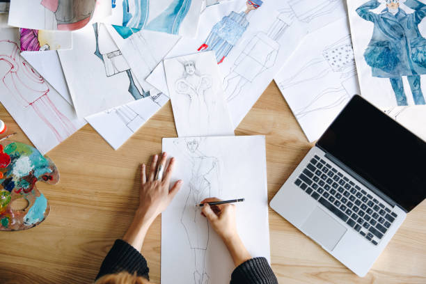 istock fashion designer sketching 852034936