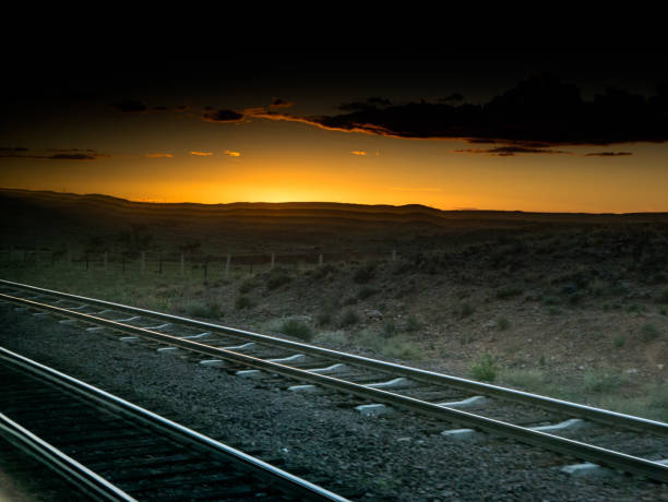 istock landscape at sunset with railroad 852040312