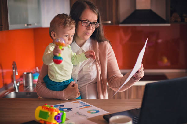 istock Single mother balancing work and family 852043804
