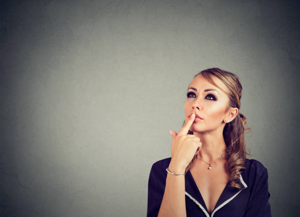 istock Beautiful woman with a thoughtful face expression 852049016