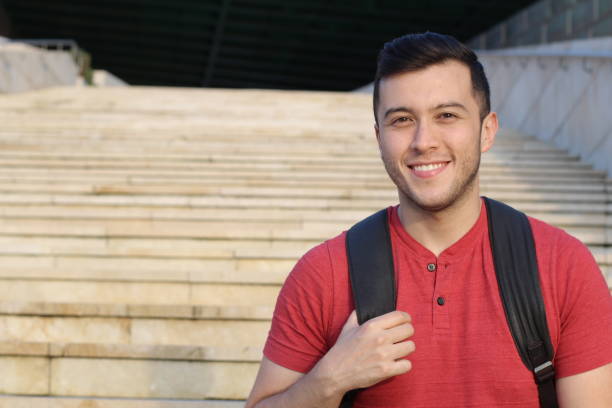 istock Motivated student heading upstairs at school 852054858