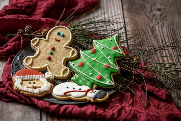 istock Christmas cookies on wooden table 852055226