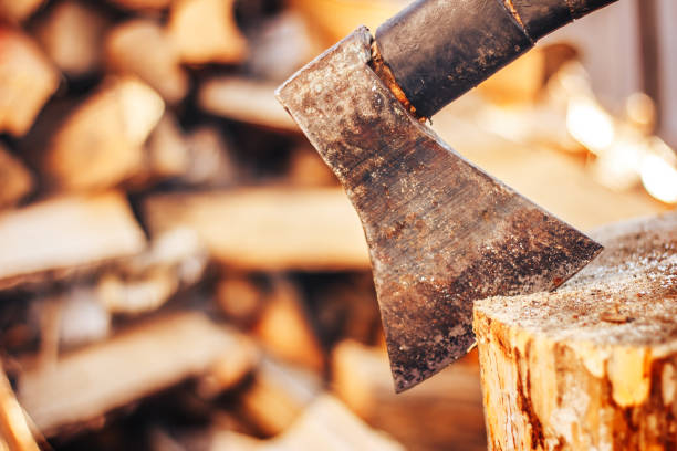 istock closeup old ax on firewood background 852055812