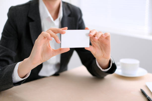 istock Business woman giving visit card 852063928