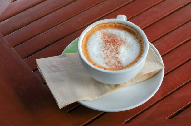 istock coffee cappuccino on the wood floor background 852064692
