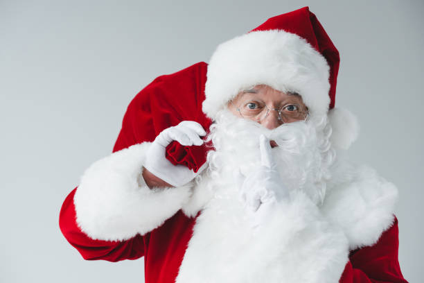 istock santa claus holding bag 852073484