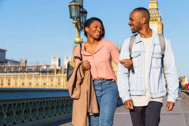 istock Loving couple walking together in London 852077752
