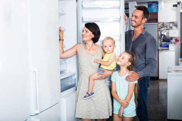 istock family choosing new freezer in store 852077820