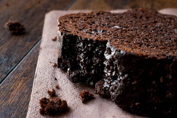 istock Chocolate Cake on dark wooden surface. 852078284