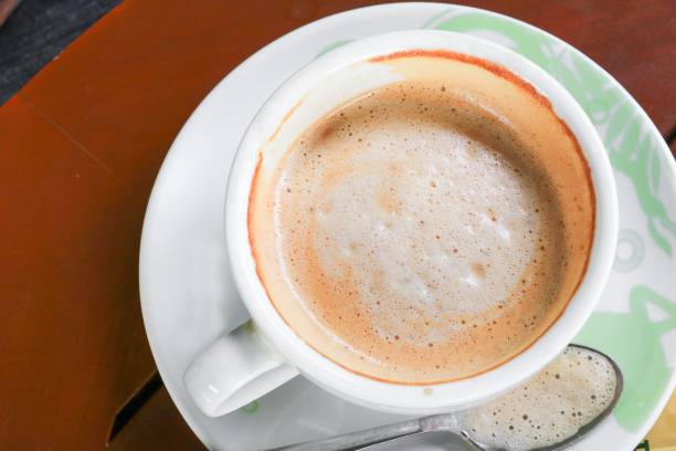istock coffee cappuccino on the wood floor background 852079224