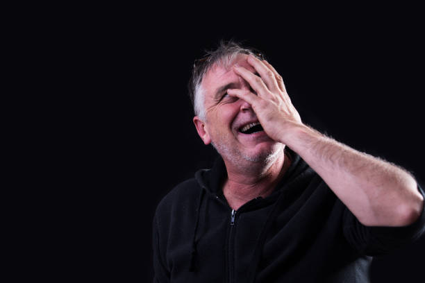 istock Man with hand on face looking worried 852085476