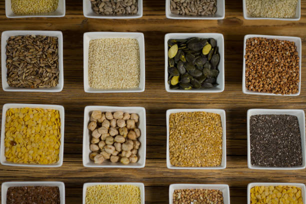 istock Various dried legumes in bowls for background, 852087972