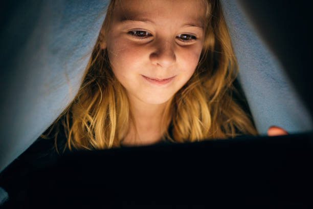 istock Sweet blondie girl playing on a Tablet. 852088020