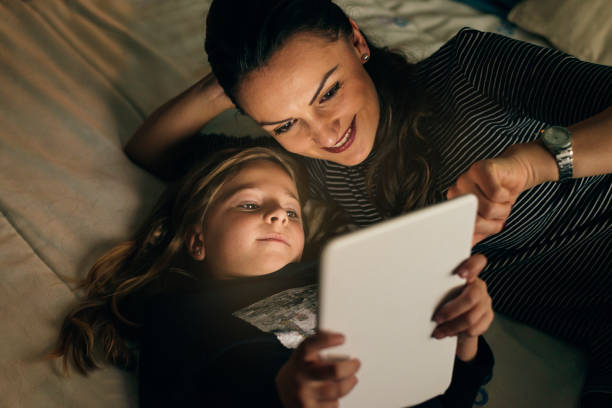 istock Mother and her child with digital tablet. 852088076