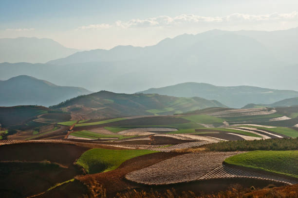 istock Red agriculture landscape with mountains in China. 852088418