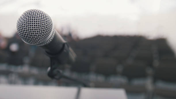 istock Conference of lecture - microphone on stage in auditorium waiting for performances, close up 852089188