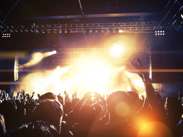 istock Concert crowd in front of a live stage 852089974
