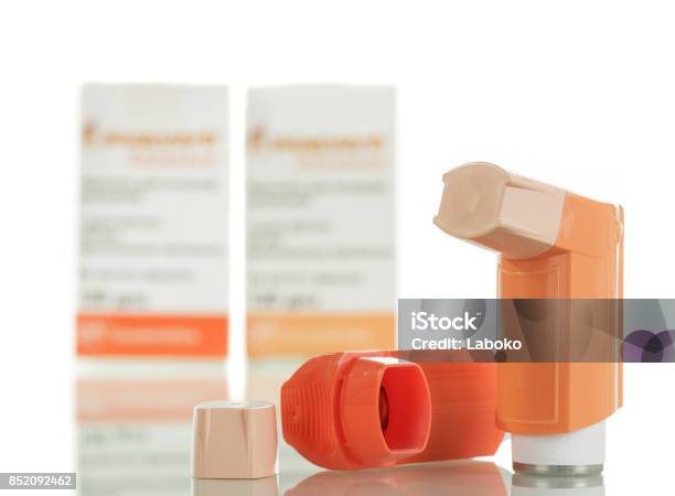 Device For Inhalation With A Dispenser Isolated Stock Photo - Download Image Now - Asthma Inhaler, Alternative Medicine, Applying