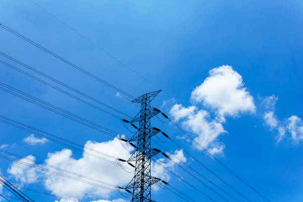 230kv high voltage electricity pylon and transmission line with blue sky and cloud