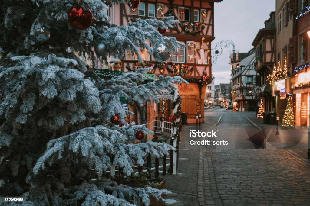Christmas time in Colmar, Alsace, France Old town illuminated and decorate magical like a fairy tale in Noel festive season at early morning time in Colmar, Alsace, France. Christmas Stock Photo