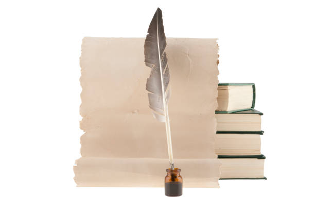 istock pen, ink and old paper with books isolated on white background 852094292