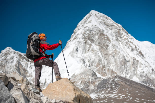 istock Trekker approaching PumoRi mountain in Khumbu valley on a way to Everest Base camp 852098800