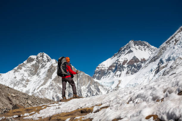 istock Trekker approaching PumoRi mountain in Khumbu valley on a way to Everest Base camp 852098808
