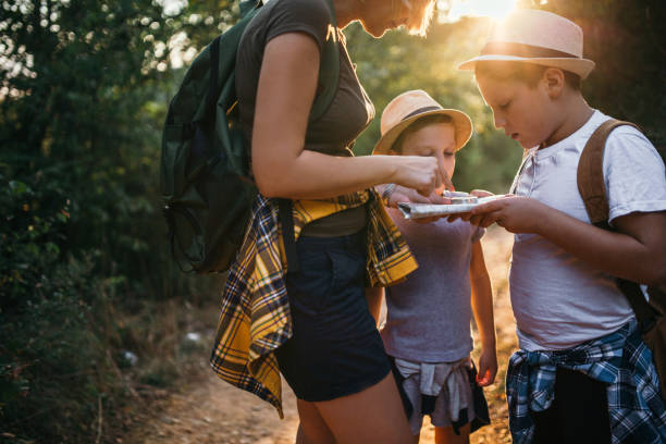 Happiness in Nature Family is hiking orienteering stock pictures, royalty-free photos & images