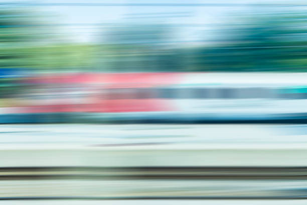 istock subway train passing through station, passengers waiting on the platform 852106574