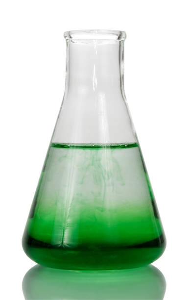 istock A chemical flask with a transparent green liquid is isolated on white background. 852106632