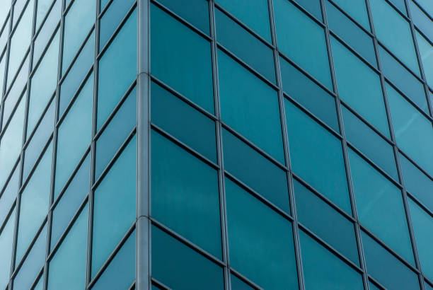 istock Facade a high-rise of glass with elliptical basic shape and pointed ends with hotel 852107170